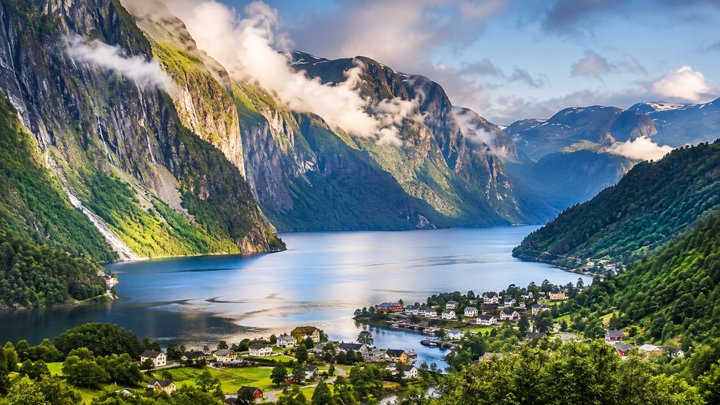 Best places to visit in Norway featuring dramatic fjords, mountains, and scenic villages
